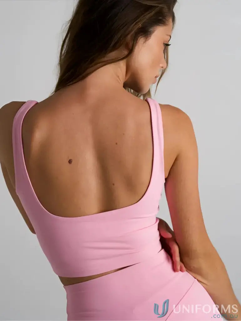 Pink square neck tank top with shelf bra perfect for workouts and casual wear