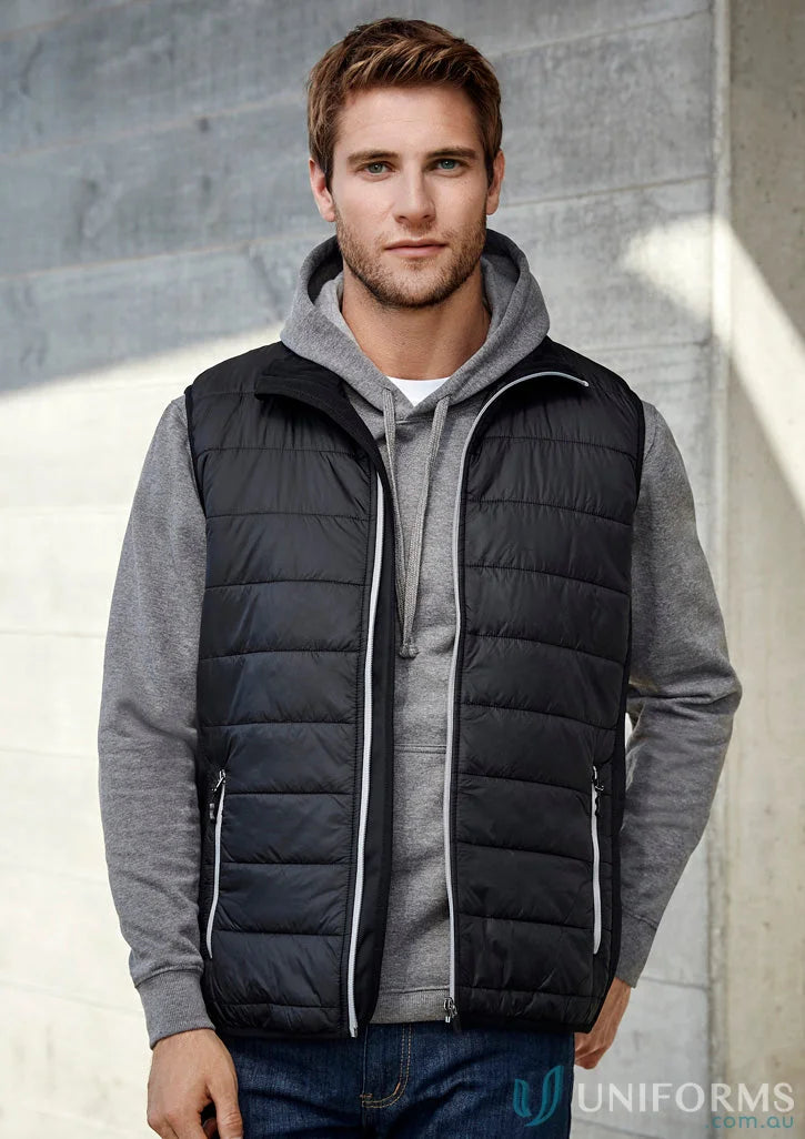 Man wearing men’s stealth vest with core warm polyfil insulation from Stealth collection