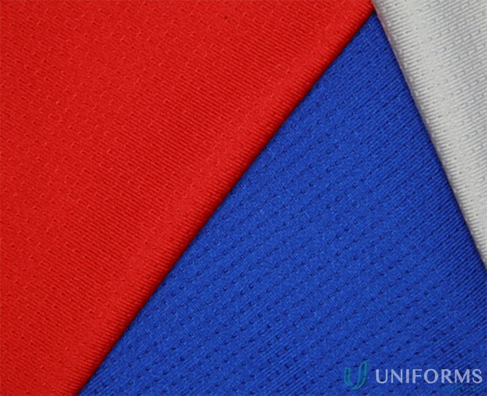 Red blue and white textured fabric from Stencil Team SS Polo cool dry uniforms workwear