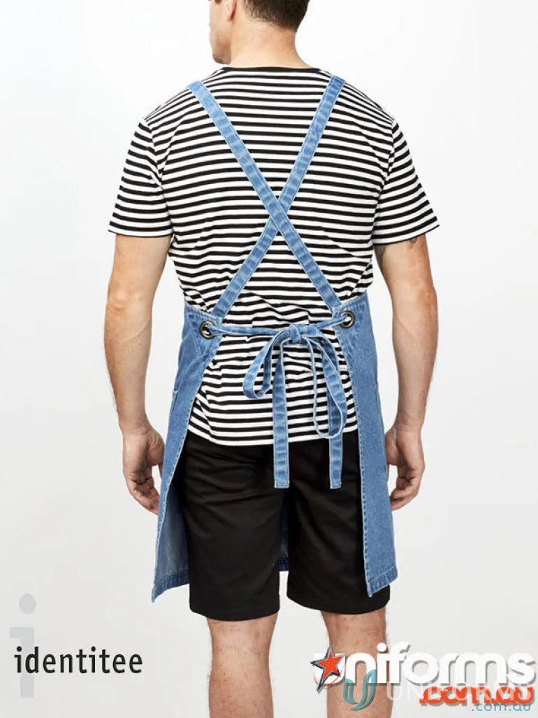 Person in black and white striped shirt wearing Stevie Stripe T-Shirt workwear white uniforms