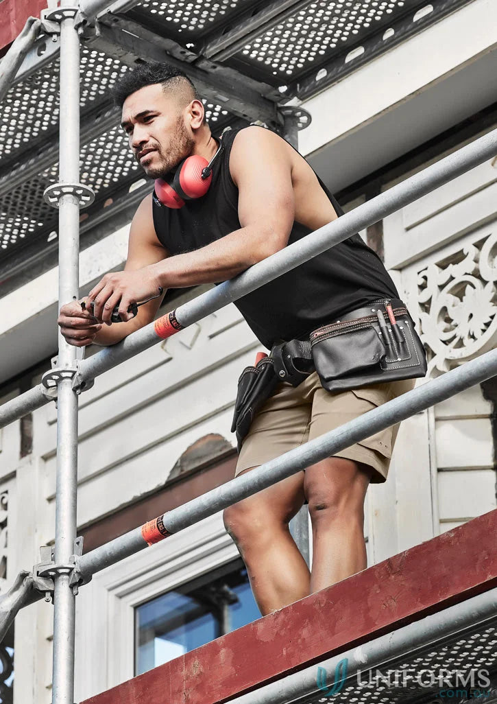 Construction worker on scaffolding wearing Mens Streetworx Sleeveless Tee with drop armholes