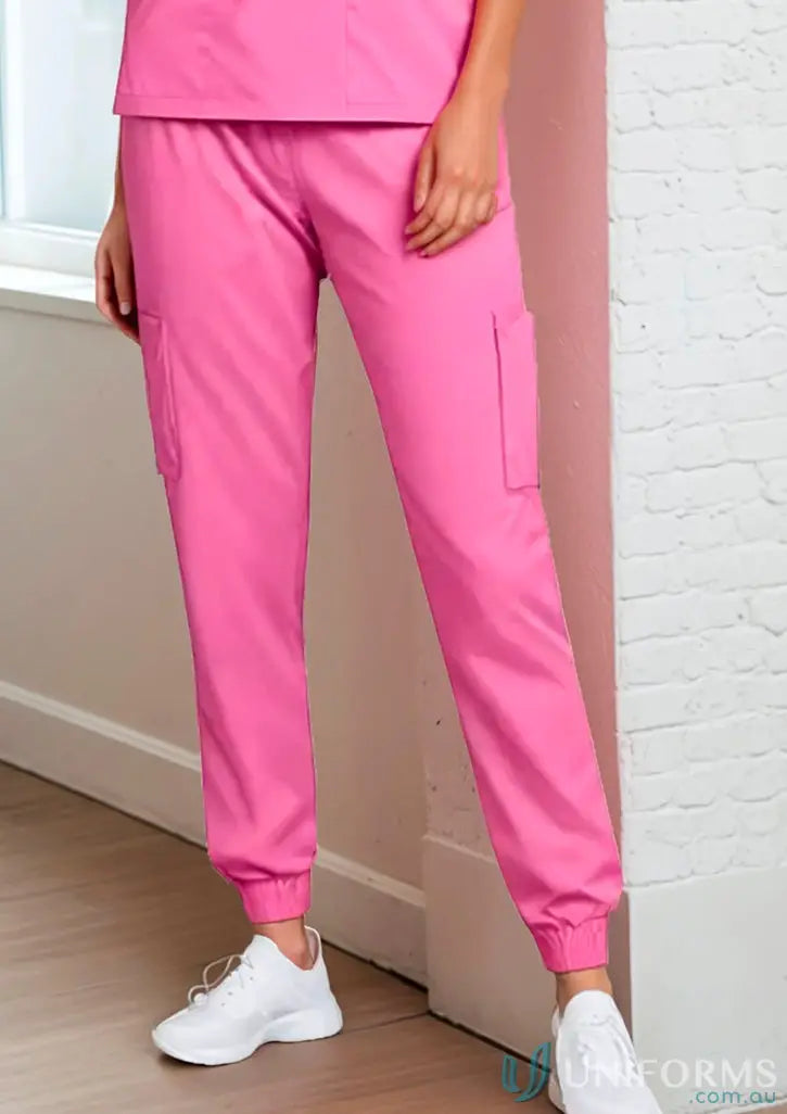 Pink cargo scrub pants from the Stretch Women’s 9 Pocket Jogger Scrub Set