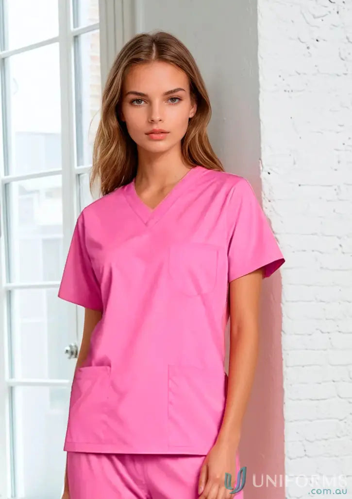 Pink women’s stretch jumper scrub set with 9-pocket jogger for ultimate comfort