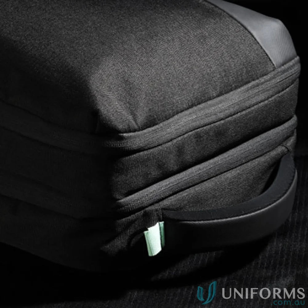 Black textured backpack corner of Swissdigital Arosa Backpack for work uniforms or casual use