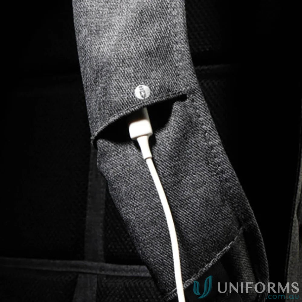 Denim backpack strap with charging cable on Swissdigital Cosmo 3.0 Backpack, padded and stylish