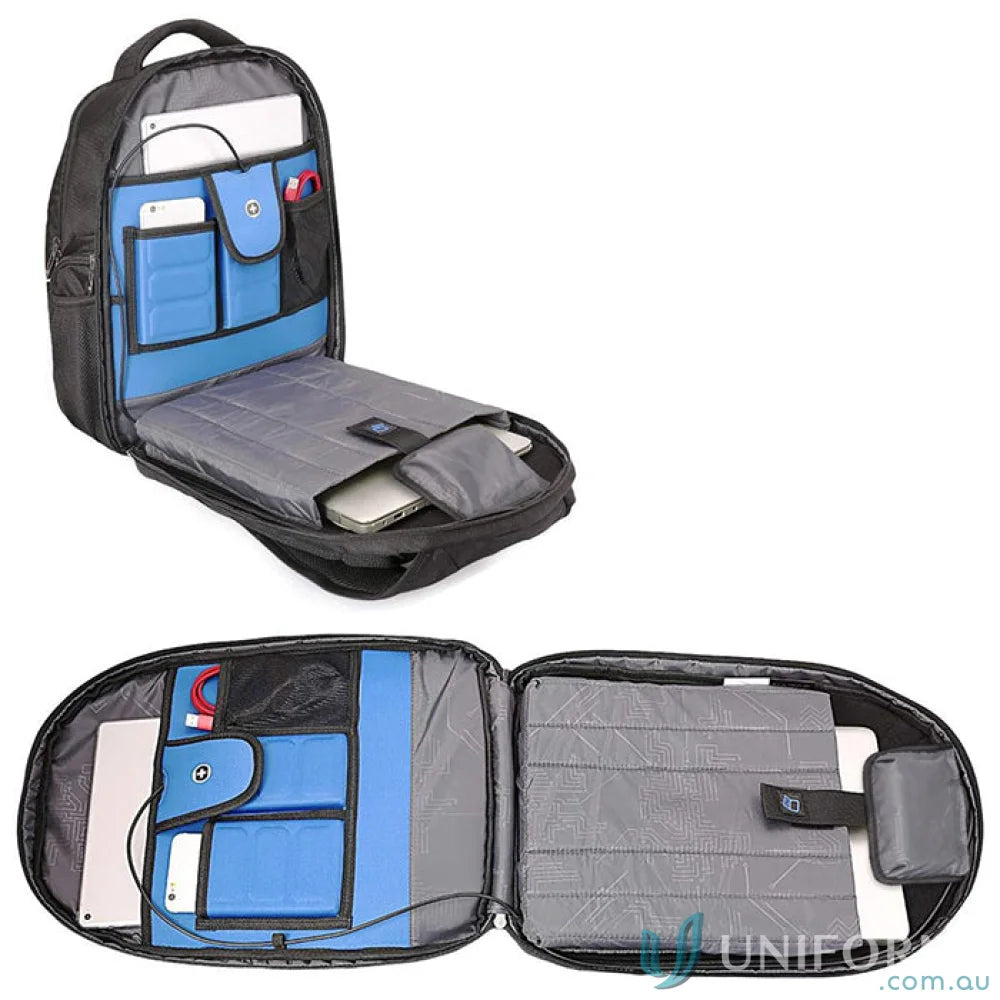 Open Swissdigital Terabyte Backpack showing fit, black exterior, blue interior pockets for workwear and uniforms