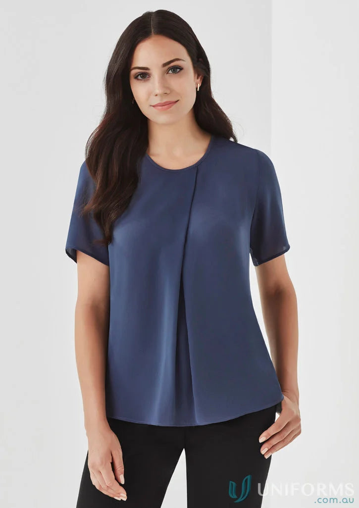 Woman wearing a Blue Sydney Top with RT065LS, perfect for everyday elegance