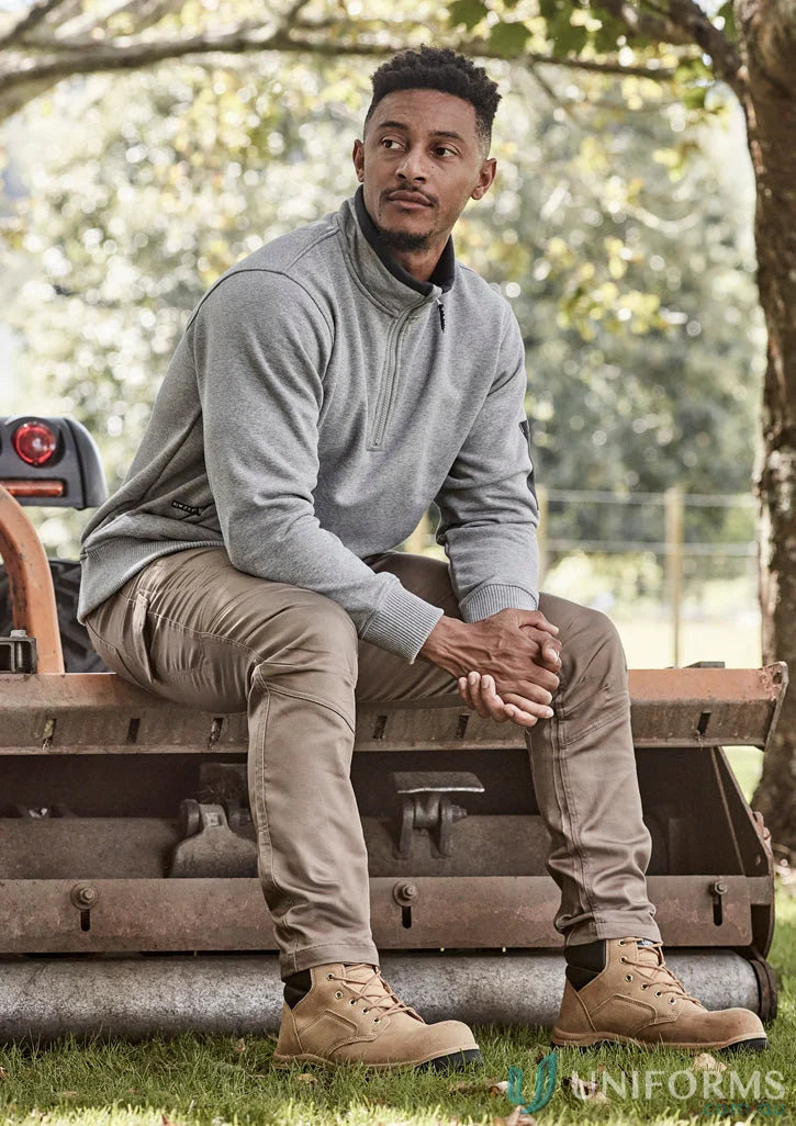 Man in Syzmic Half Zip Fleecce Jumper showcasing zip brushed fleece and zippered hip pockets