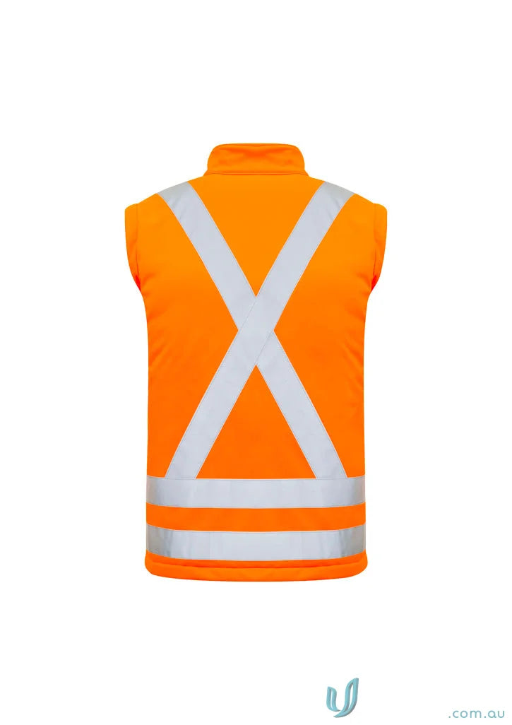 Orange safety vest with reflective stripes on Syzmic RAIL BioMotion 2in1 X Back Softshell Jacket in work environment