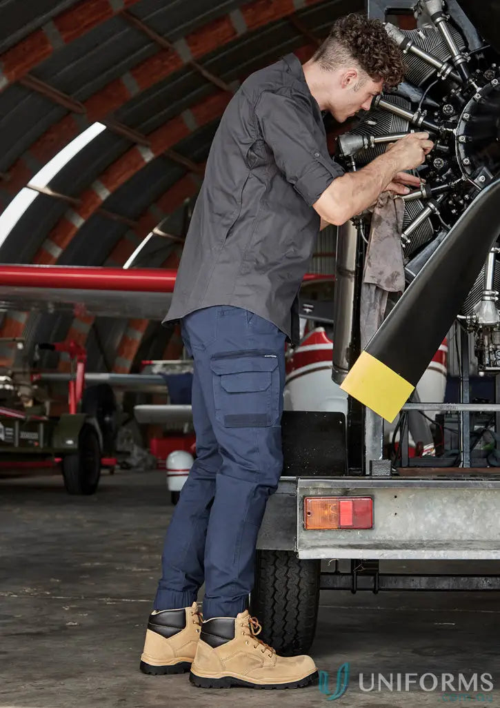 Man wearing Syzmic Streetworx Heritage Cuffed Pant with triple-stitched crotch panel