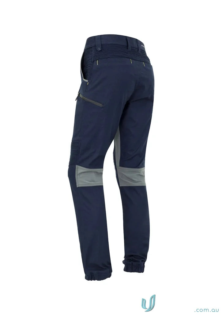 Navy blue Syzmic Men’s Streetworx Stretch Pant with gray knee patches and stretch pleating