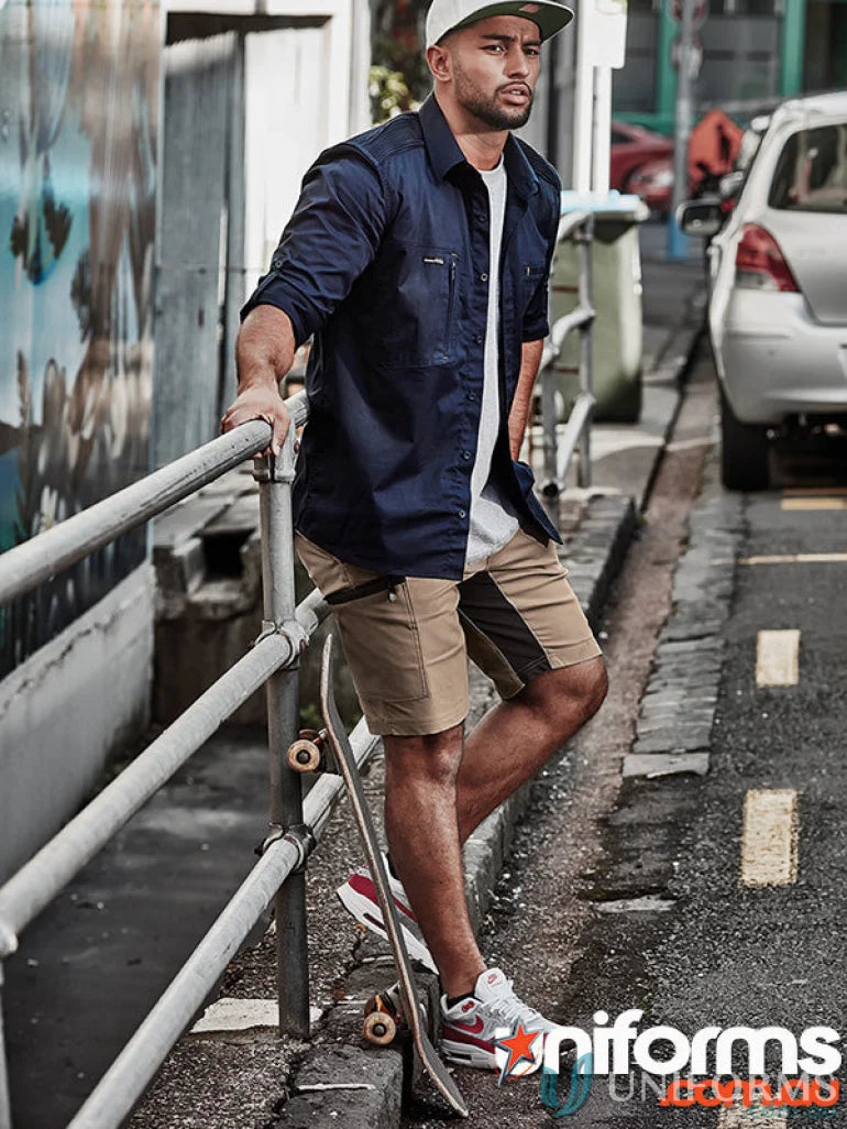 Man in casual Syzmic Streetworx Stretch Shorts with four-way stretch crotch for comfort