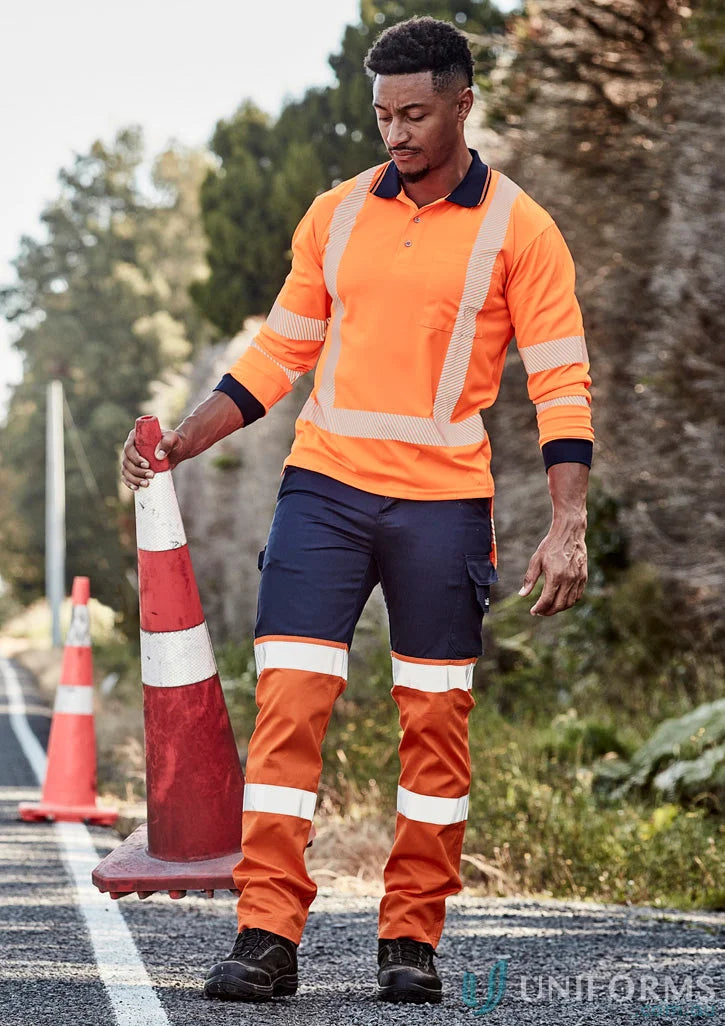 Man in Syzmik Men’s Bio Taped Pant ZP980 high-vis workwear, stay visible on site