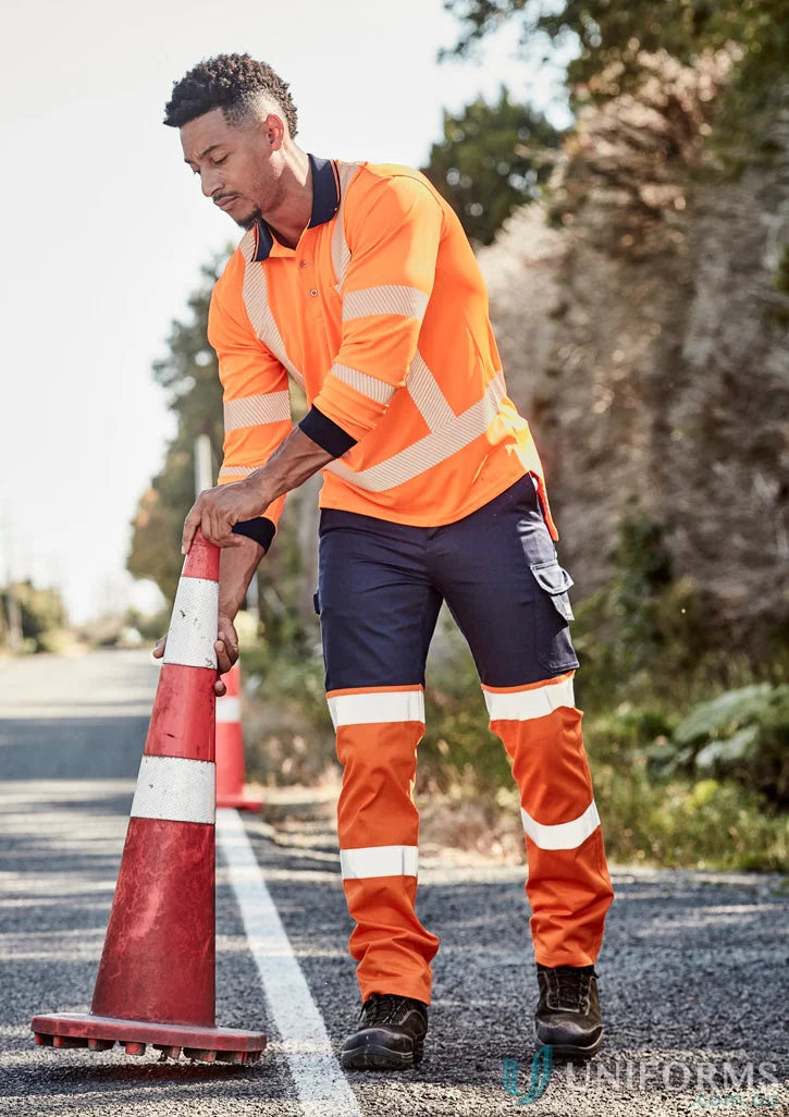 Man in Syzmik Men’s Bio Taped Pant ZP980 staying visible with high-vis workwear