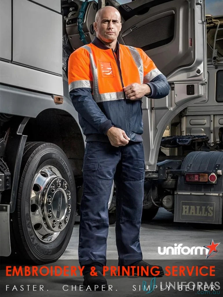 Man in workwear wearing Syzmik Day/Night Quilt featuring quilted flying jacket style