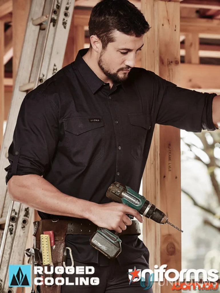 Man wearing a black Syzmik men’s rugged cooling long sleeve shirt for durable comfort