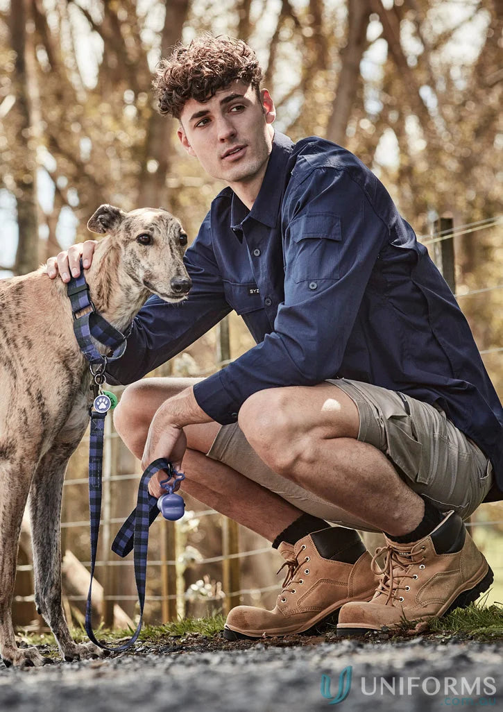 Man in workwear with dog wearing SyzmikMen’s Rugged Cooling LS Shirt, ideal men’s cooling long shirt