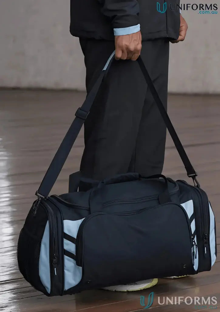 Black and light blue Tasman Sports Bag perfect for uniforms or workwear storage