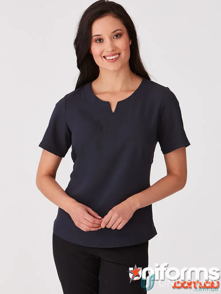 Woman’s navy blue scrub top from City Collection Knit woven short sleeve style
