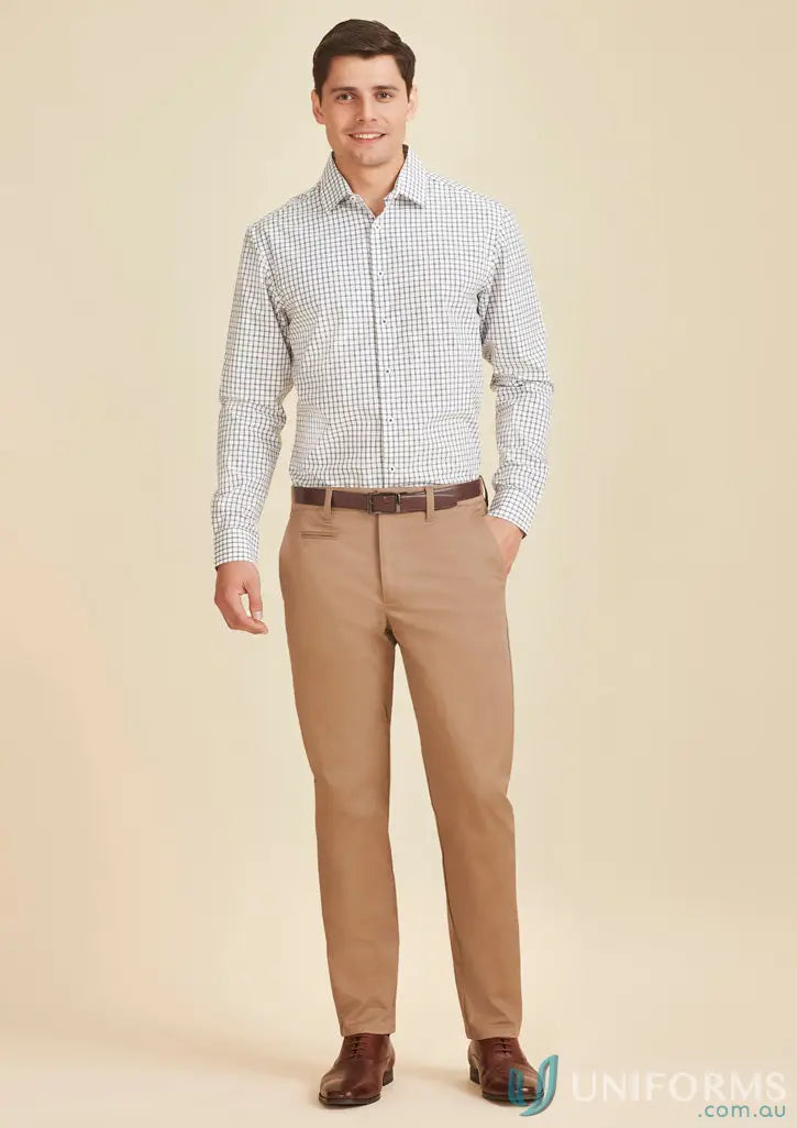 Man wearing men’s Traveller Modern Stretch Chino Pant in dress shirt and khakis
