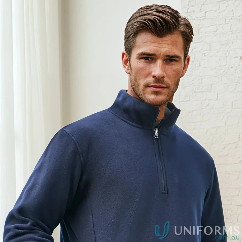 Man in navy Trinity Half Zip Jacket from Biz Collection Trinity with concealed pockets