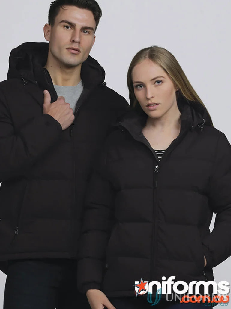Two people wearing black unisex edge puffa jackets, stay warm and water repellent rated