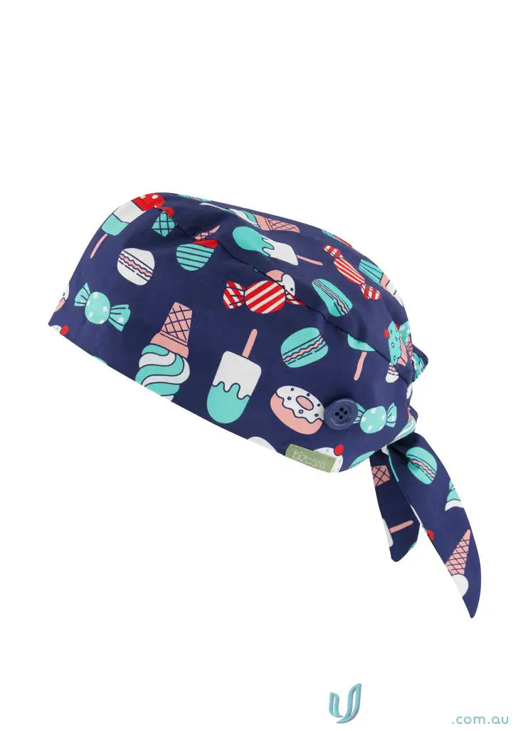 Navy blue unisex printed scrub cap with fun candy pattern to add personality