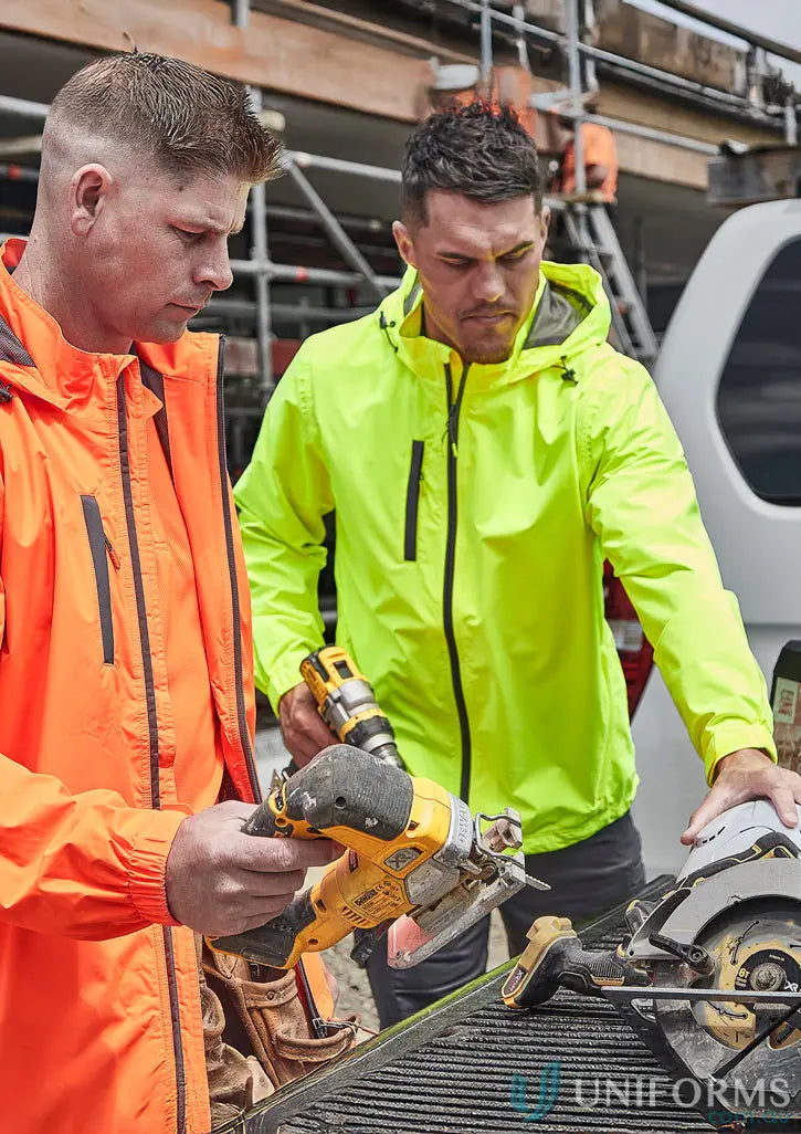 Construction workers with power tools wearing unisex super light rain packable rain jacket