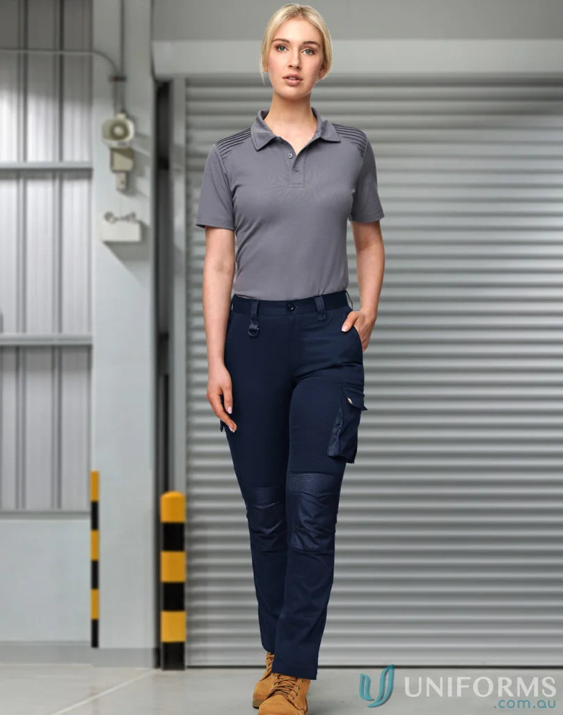 Women’s grey polo shirt with navy utility stretch cargo work pants for comfort
