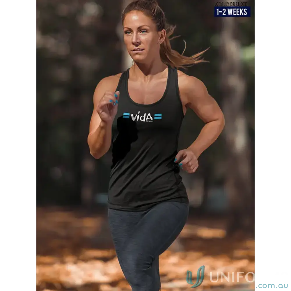 Athletic woman running in Vida Fitness Ladies Raceback Top for fitness ladies raceback style