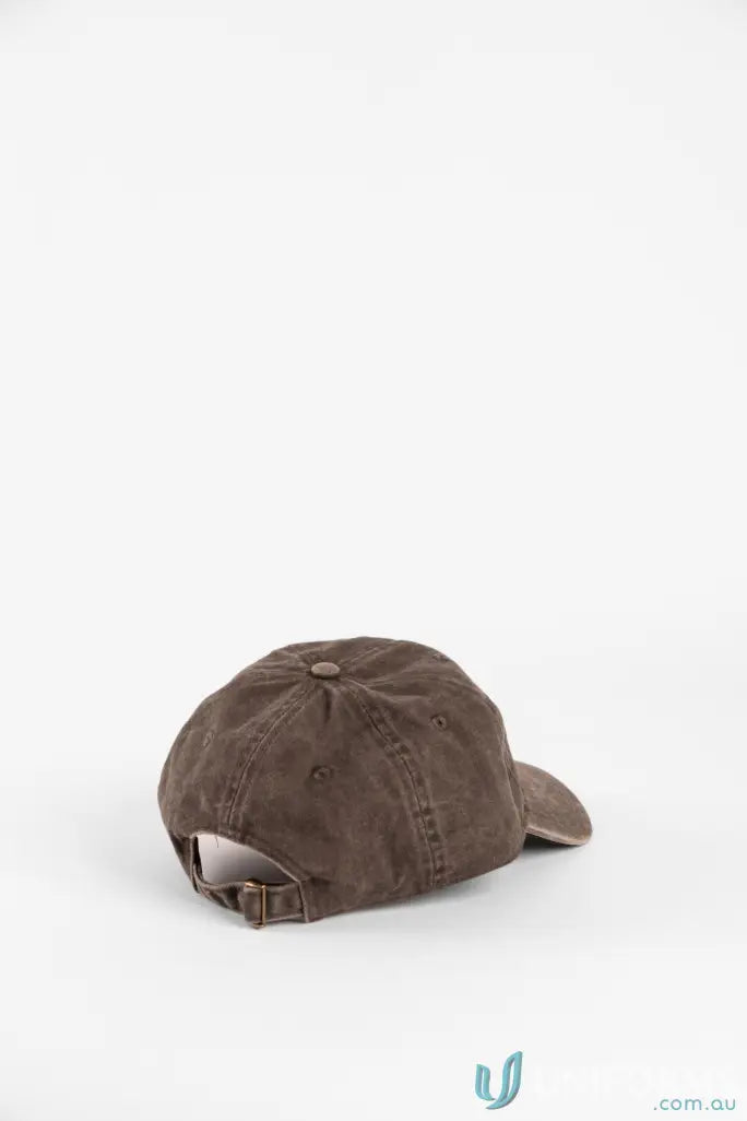 Brown baseball cap with adjustable strap and button closure, made of cotton or similar fabric.