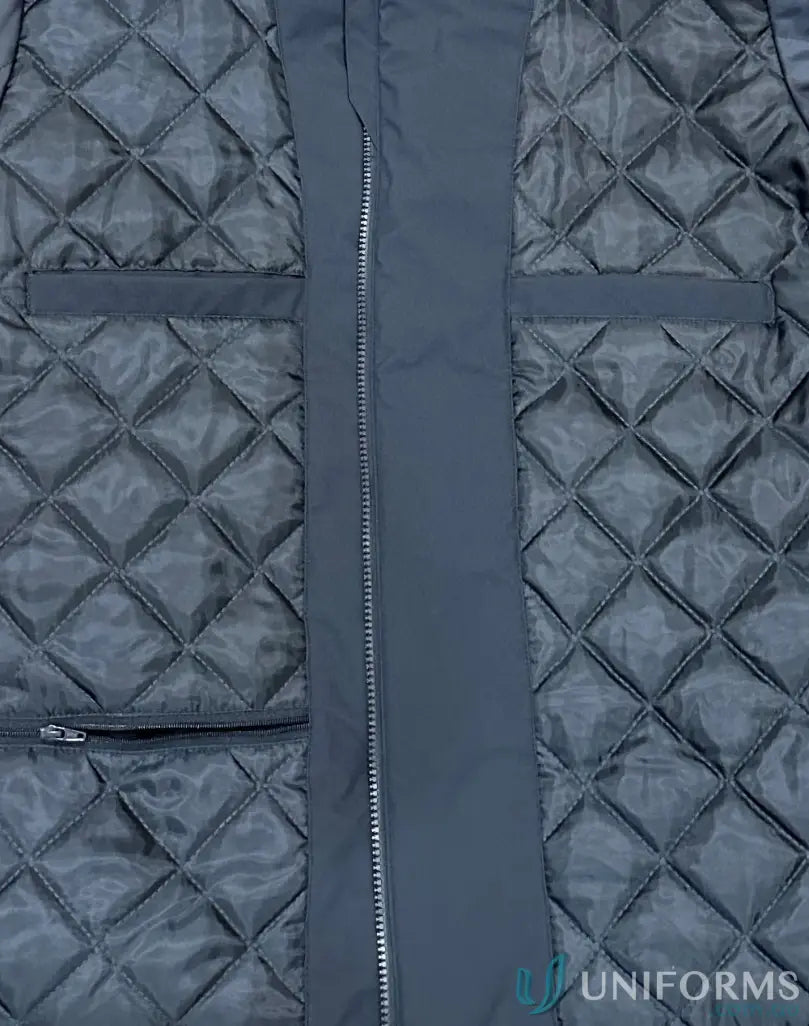 Dark grey waterproof quilted jacket with zipper and pockets, perfect for stay dry workwear