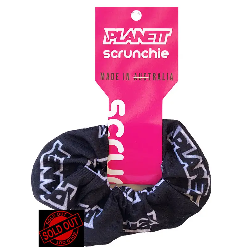 Black planet scrunchie with white and gray planet lettering on elastic fabric perfect for work uniforms and workwear