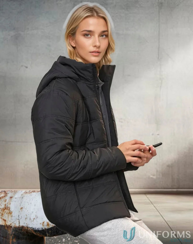 Black hooded puffer jacket from Winning Spirit 3D Cut Sustainable Seamless Parka with certified recycled pet and durable water-repellent fabric