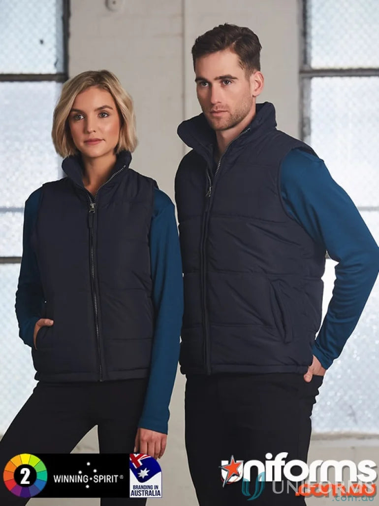 Two people rocking navy Puffer Vests from jk47 Everest Winning Spirit Workwear in pongee shell