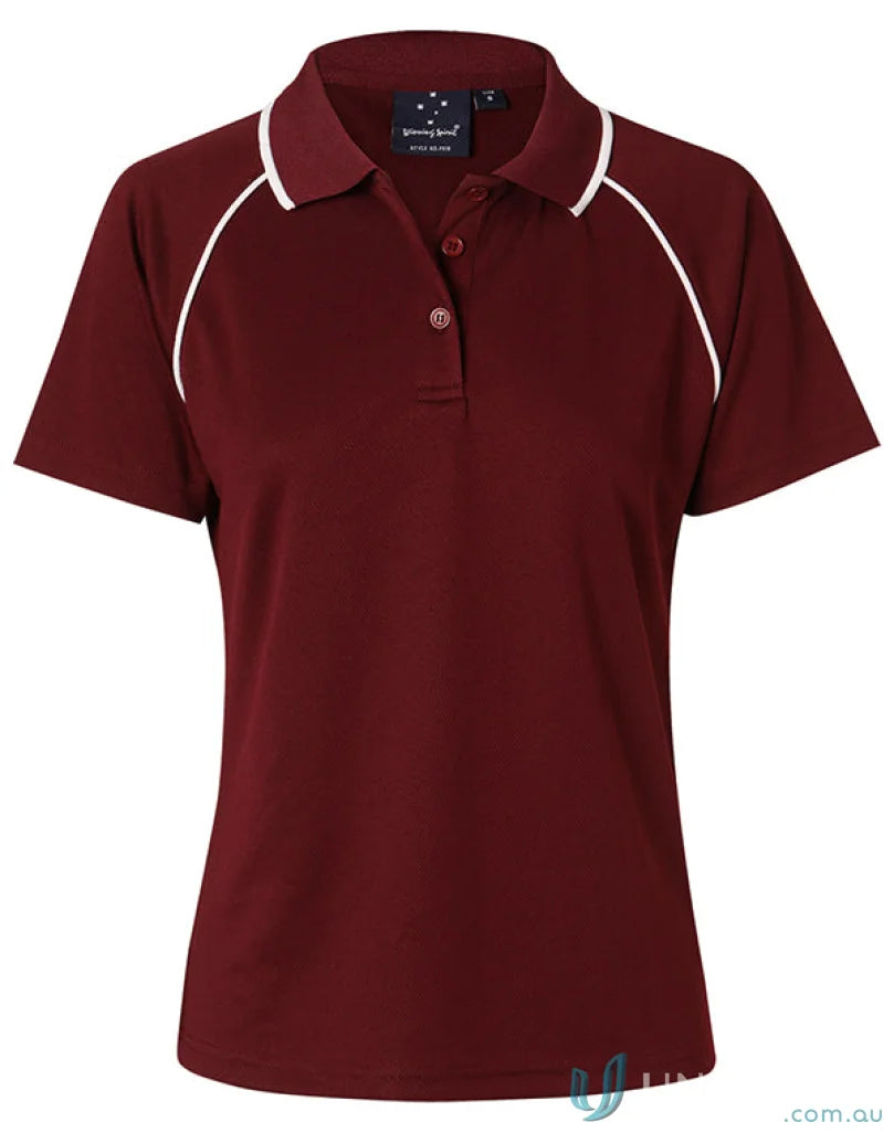 Winning Spirit Ladies Champion Raglan Polo in maroon with white piping and short sleeves