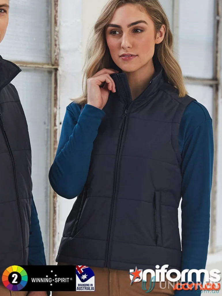 Navy blue jk29 padded vest with zippered welt pockets made from durable nylon rip-stop fabric