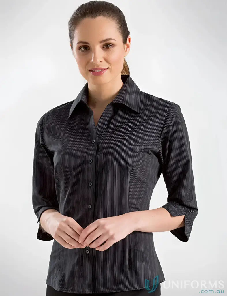 Woman in a dark stripe shirt from 352-JK Keval Women’s, check size chart