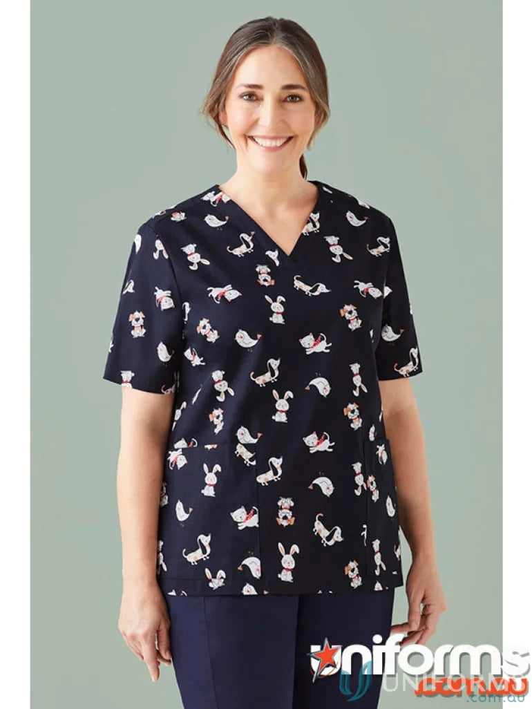 Woman wearing printed best friends scrub top perfect for workday feels overwhelming