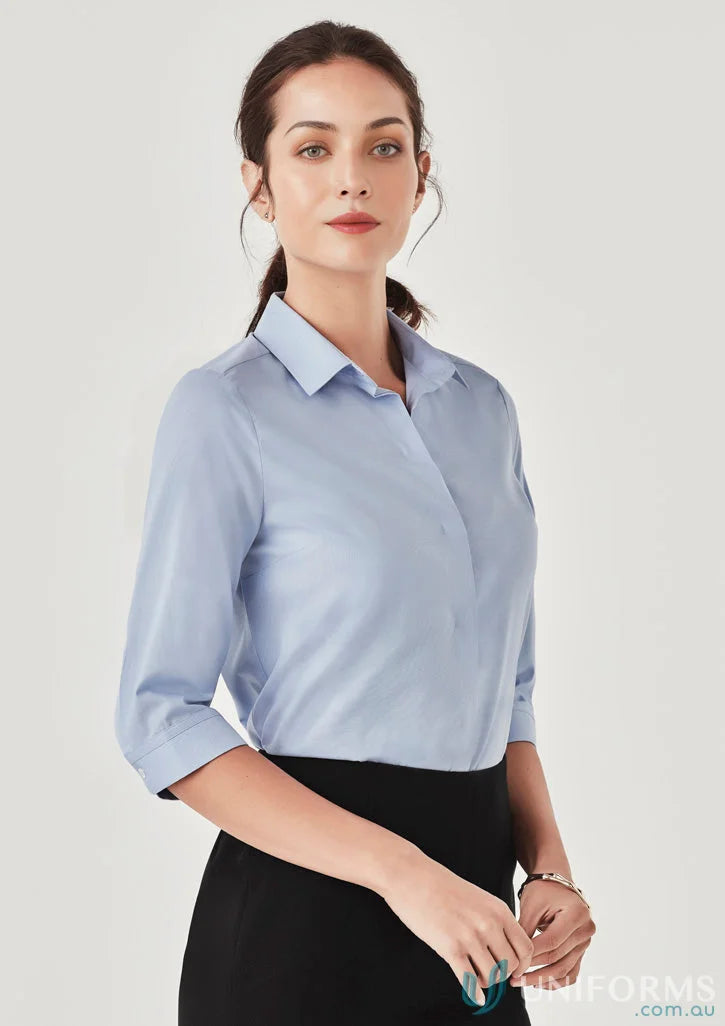 Light blue women’s Charlie 3Qtr shirt with hidden bust button for hospitality roles seeking style