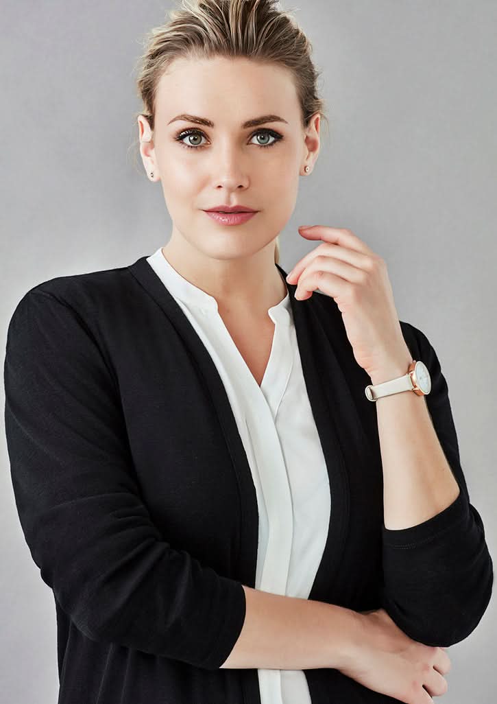 Woman wearing Womens Chelsea Long Line Cardigan RLC970L with watch in black and white style