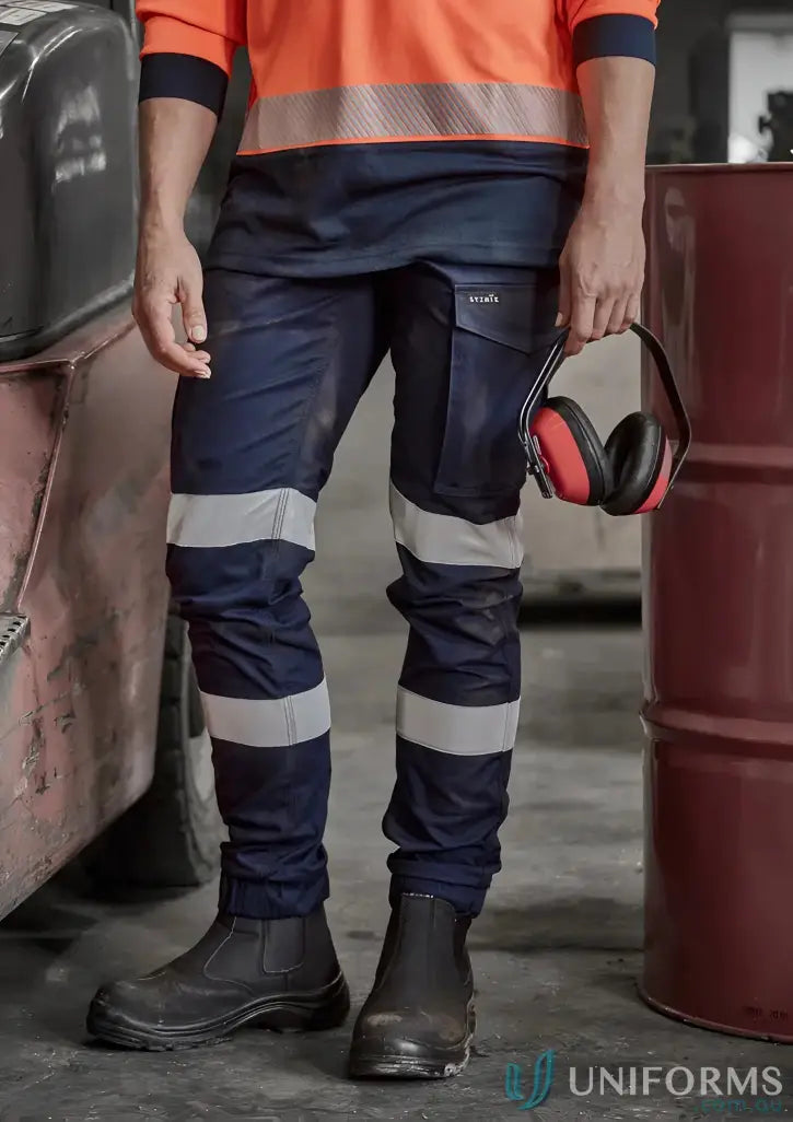 Workman in Women’s Essential Stretch Taped Cargo Pant with stretch reflective tape and boots