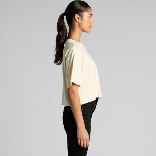 Cream womens Martina crop tee with black jeans and ponytail