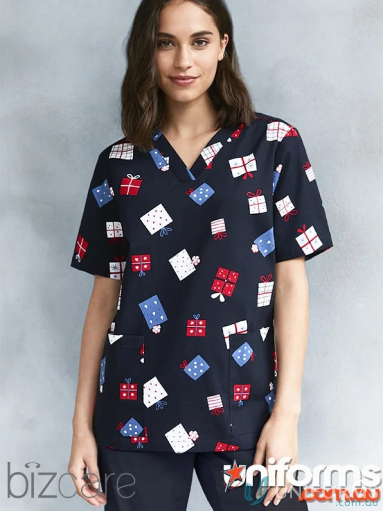 Festive gift-patterned scrub top from Biz Care, perfect for holiday cheer and comfort