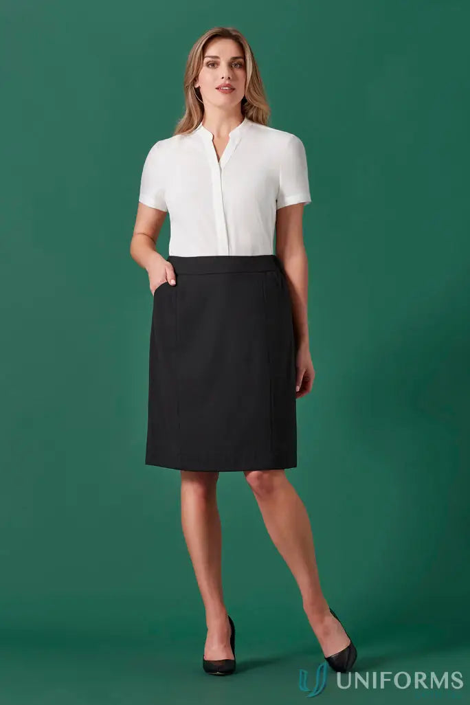 Woman modeling women’s renew functional pencil skirt with white blouse for day long style