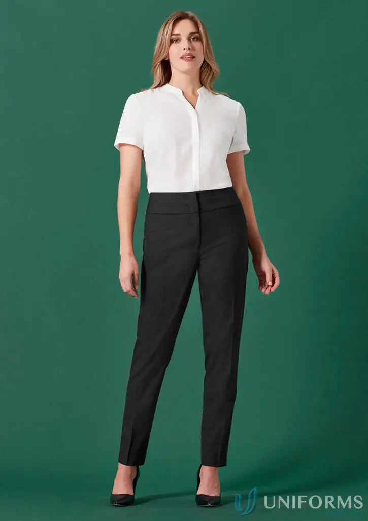 Woman wearing Womens Renew Mid-Waist Slim Leg Pants with a white shirt and black heels