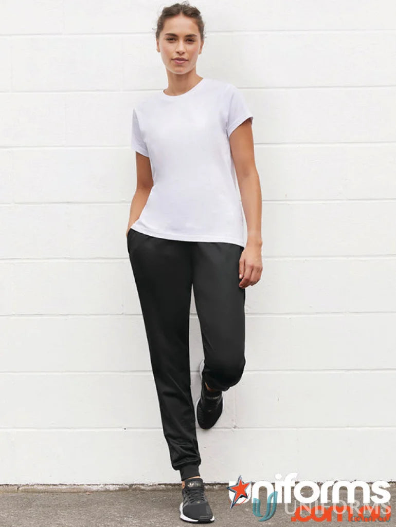 Woman wearing white t-shirt and black sweatpants in Womens Score Pant from Biz Collection Women’s