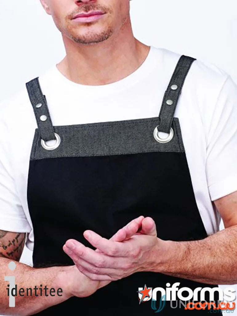 Xavier apron with stainless steel studs and A26W waist straps, man in black apron