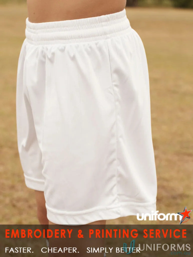 White athletic youth soccer shorts with elastic waistband for youth soccer players