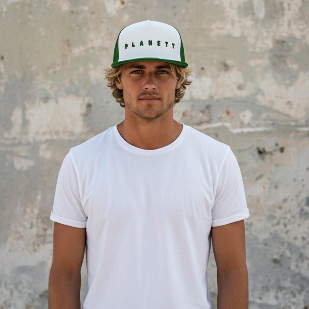 White and green zari trucker cap with planett embroidery perfect for casual workwear and uniforms